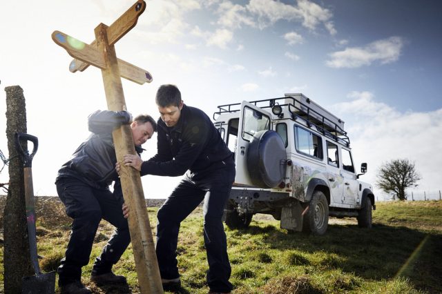 South Downs Rangers putting a new fingerpost in place on the South Downs Way.