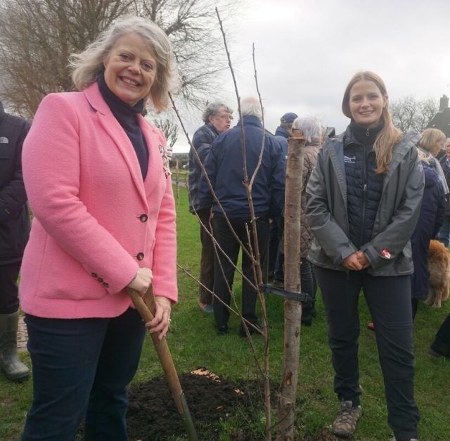 Lady Emma Barnard with National Park Assistant Ranger Gemma North after planting a tree for West Sussex to celebrate the King's coronation