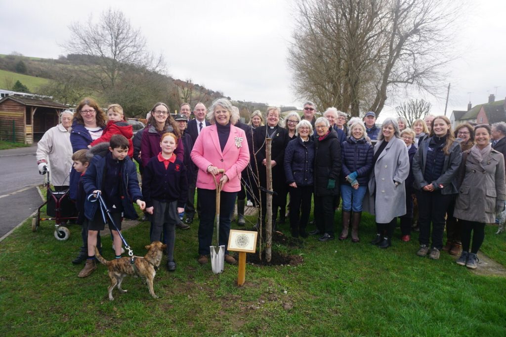 Lady Emma Barnard and villagers at the tree planting ceremony in Singleton - grouped around the newly planted tree