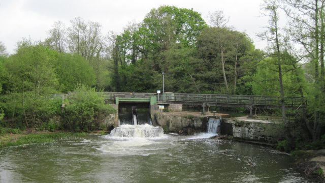river Rother image showing the weir at Midhurst with water rushing into the river