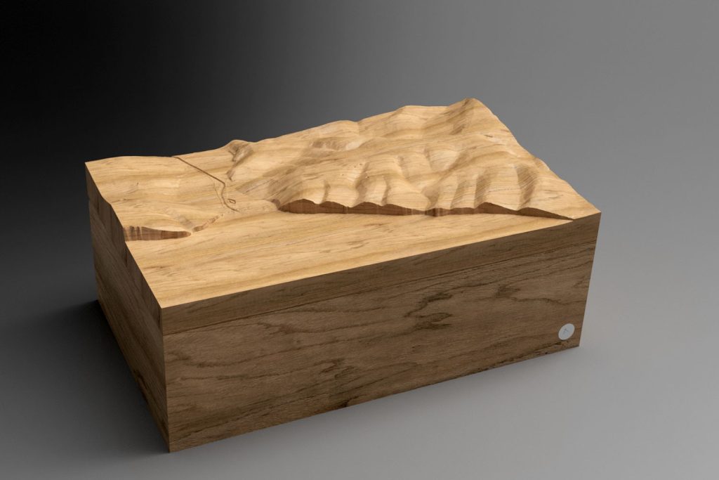 image shows a wooden box with the lid showing the contours of a chosen location - in this case the Seven Sisters cliffs in the South Downs National Park. 